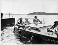 Viscount Willingdon (Governor General of Canada) and Viscountess Willingdon in the "Whippet" on Lake Rosseau, Ont. July 5th, 1928 5 July 1928