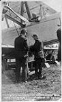 Installation of wireless in vickers "Vimy" aircraft of Captain John Alcock and Lieutenant Arthur Whitten Brown, Lester's Field June 1919