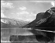 Boat leaving dock Lake Minnewanka, Banff National Park, [Alta.] 1922