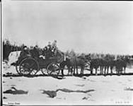 Yukon Stage Coach during break-up in the spring when the through horse-wagons were put into commission, White Horse - Dawson, Y.T., 1923