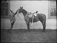 Lance-Corporal Stafford, Royal Canadian Dragoons with "Dolly", Stanley Barracks 29 Oct. 1934