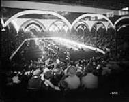 [Cattle judging in the Coliseum. Canadian National Exhibition, Toronto, Ont.] [1927]
