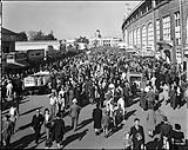 [Crowds outside the Grandstand. Canadian National Exhibition, Toronto, Ont.] [Sept. 1938]
