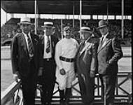 Group of men on Judges Stand [with Lucky Teter]. Grand Stand. Canadian National Exhibition, Toronto, Ont Aug. 30, 1938