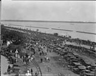 [Crowds at the waterfront from the Government Building. Canadian National Exhibition, Toronto, Ont.] [1927]