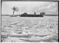 "sarnia" (right) and "International" (left) on St. Clair River, [Ont.], in winter, February 1906 Feb. 1906