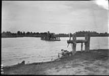 Automobile and buggy crossing on ferry, Walpole Island, [Ont.], 1 Sept., 1910 1 Sept. 1910