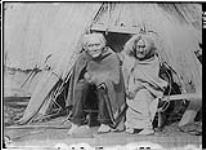 [Cowichan couple {man possibly Peter Sitholatza)] Cowichan Indians of British Columbia 1912