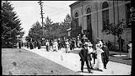 Farmers leaving dining hall of the Ontario Agricultural College 18 June, 1914