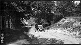 Harvey's automobile on a hill 19 July, 1914