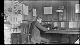Wireless operator and instruments [at a wireless station] in Point Edward 18 Nov. 1914