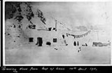 Removing snow from roof of [Bernier's whaling station], 10 April 1911 10 April 1911