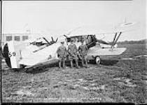 Pilots with Armstrong Whitworth 'Siskin' IIIA aircraft 59 of the R.C.A.F. (L-R): F/O E.A. McNab, F/L F.V. Beamish, P/O E.A. McGowan 26 Aug. 1929
