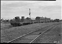 Armoured train showing gun positions and searchlights, Canadian National Railways Shops 15 July 1942