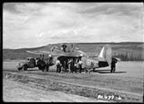Aircraft with truck and people 15 July 1943