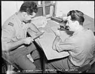 R.C.A.F. personnel working on leathercraft 25-Jul-50
