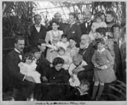 [Sir Sandford Fleming and his family in their conservatory 'Winterholme' on corner of Daly Avenue and Chapel Street, Ottawa, Ontario,] Christmas Day, 1899 [graphic material] 25 Dec. 1899.