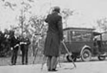 Roy Tash making motion picture of Lord Bessborough, Governor General and R.B. Bennett, Prime Minister n.d.