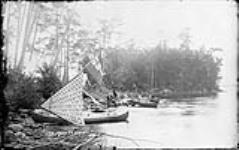 A group of vacationers at Reef Island Camp, Muskoka Lakes, Ont., c. 1887 1887