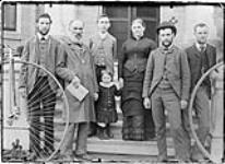 A family group and penny farthing ca. 1887
