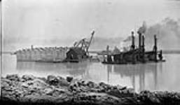 Concrete pier and dredge, Welland Canal 7 July, 1916