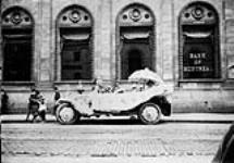 An automobile decorated for Rose Day in Toronto 3 July, 1916