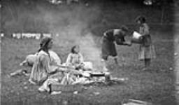 Gypsy children washing at a camp on the Humber River Oct. 12, 1918