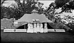 Red Cross tent and nurses at Girl Guide Rally, at Pellatt's [Casa Loma, Toronto] 25 Sept. 1915