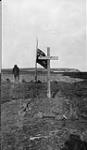 The grave of Mallock and Mamen at Rogers Harbor with flag at half mast 1914