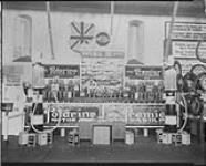 Imperial Oil Limited display of Polarine Motor Oil and Premier Gasoline ca. 1933