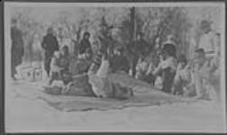 Indian leg wrestling, Winnipeg, [Man.] Dec. 1922.