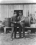 Mr. Mart Hovis and Mr. Brown, the two drillers that brought in the first producer in Turner Valley, [Alta.] 1914