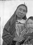 Inuit woman and child August 1927.