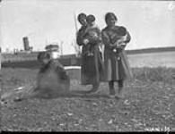 [Unidentified Cree women and children] Original title: Cree Indians August 1926.