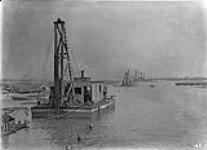 Pile driver, Derrick & Dredge Ship Channel, Toronto, Ont Oct. 17, 1914