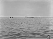 Surveyors in Lake, off Fisherman's Island Toronto, Ont May 14, 1915