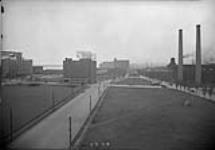 (General views) View west down Harbor St. from Toronto Harbour Commission Administration Building, Toronto, Ont May 8, 1944