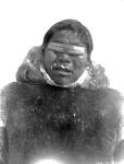 [Netselingment Inuk man wearing Inuit snow goggles - photo at village on ice South of Rae Strait] Original title: Netselingment man wearing native snow goggles - photo at village on ice South of Rae Strait 1926
