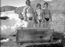 [Inuit women at a Royal Canadian Mounted Police post] Original title: Native women, R.C.M. Police post September 1931.