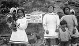 An enterprising tailor of Sydney was reponsible for this. Third women on left is Arnakallak, Kaumajuk; Second women on right is Panikpak, Martha 1929