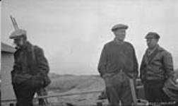 P.A. Taverner, Ornithologist, National Museum of Canada; George P. Mackenzie and officer in charge of construction work for the Marine & Fisheries Direction-finding Station Resolution Island 1929