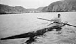 [Inuk man and his kayak at Killiniq]. Original Title: Eskimo and his kayak at Port Burwell 1929