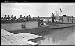 R.C. Mission boat "Immaculata" arriving at Reindeer Station with boys 1946