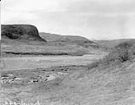 A view across the valley of the Koukdjuak River to the northeast in latitude 63ï 09' N, Kakokadluk Mountain in right distance 2 July 1931.