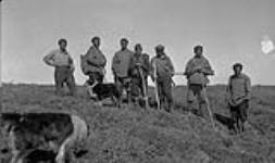 [Group of reindeer herders and their dogs] July 1937.