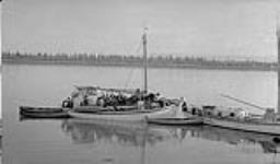 [An Inuit schooner preparing to move to whaling grounds east of Richards Island] Original Title: An Eskimo schooner preparing to move to whaling grounds east of Richards Island July 1941.