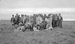 Group at reindeer round-up, Kidluit Bay, Richards Island, N.W.T., 1941 [June 1941-September 1941].
