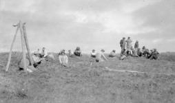 Round-up crew waiting for herd at end of corral fence, Kidluit Bay, Richards Island, N.W.T. [June 1941-September 1941].