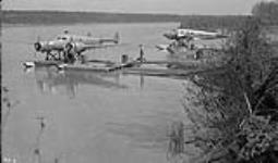 View of Three Mile Island seaplane base, showing two Twin engine Barkley - Grow plane at C.P.A. floats 1943