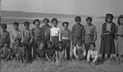[Group of children, Fort McPherson, N.W.T.] Group of Indian children, Fort McPherson, N.W.T c.a. 1946